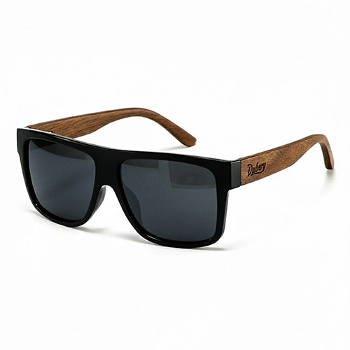 Sunglasses with black frames and wooden arms on a white background