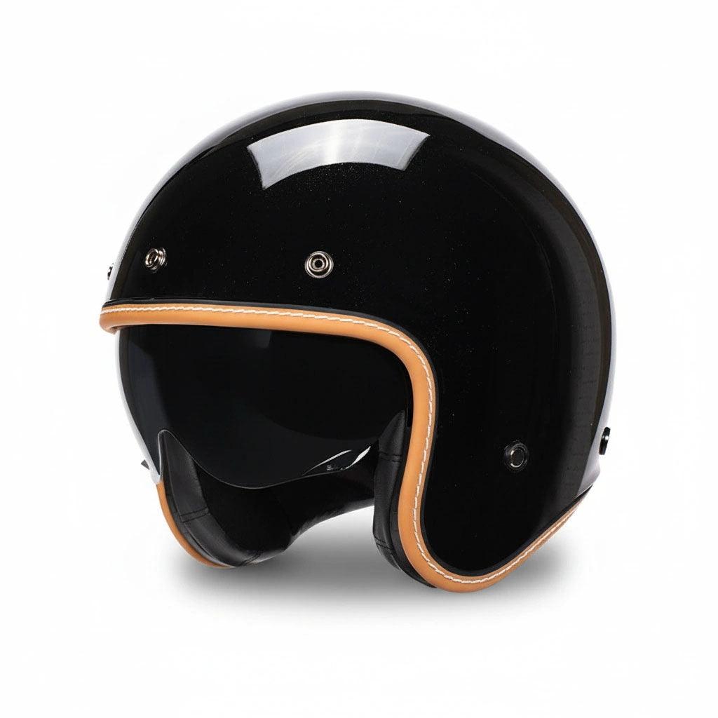 Black motorcycle helmet with brown accents on a white background