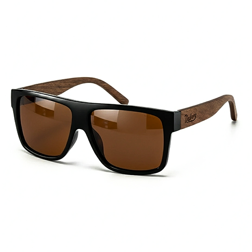 Sunglasses with black frame and brown lenses on a white background