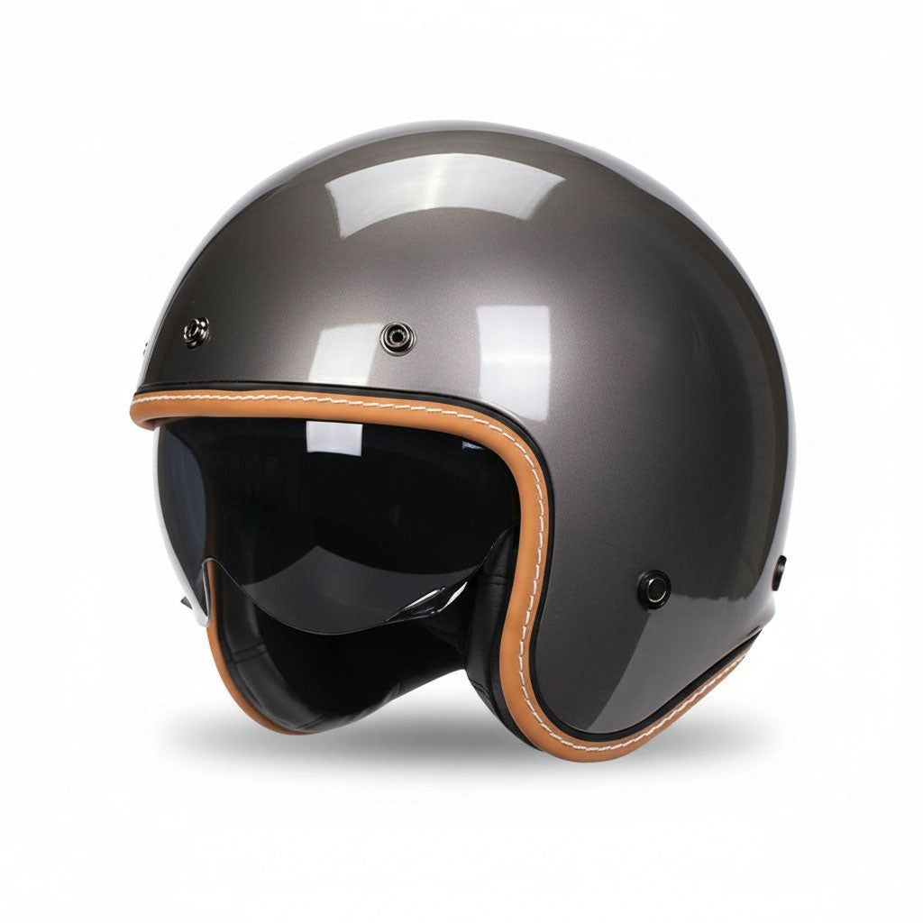 Glossy black motorcycle helmet with brown accents on a white background