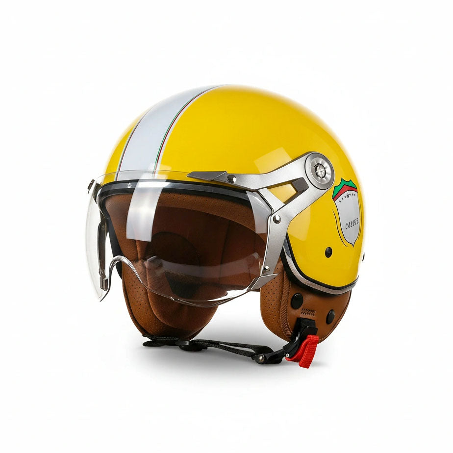 Yellow and brown helmet with a clear visor on a white background