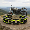 Motorcycle chain lock on a rock with a motorcycle in the background