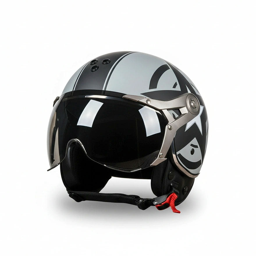 Black and silver helmet with a visor on a white background