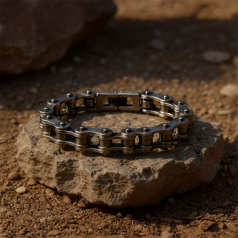 Metal chain bracelet on a rock with a natural background