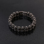 Metal chain bracelet on a black background