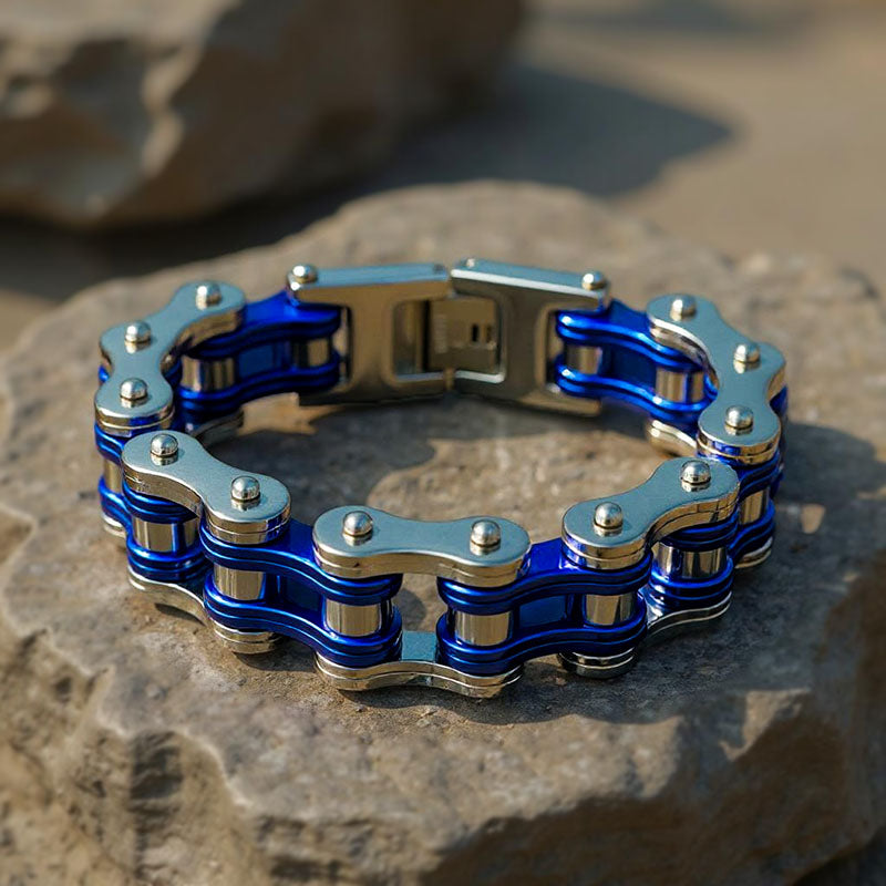 Blue and silver chain bracelet on a stone surface