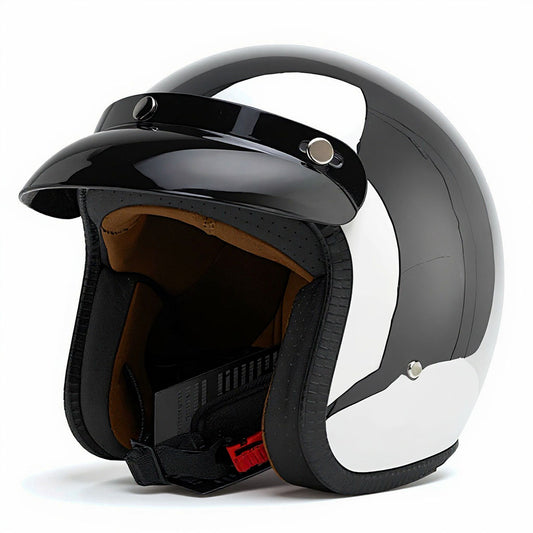 Black and white motorcycle helmet with visor on a white background